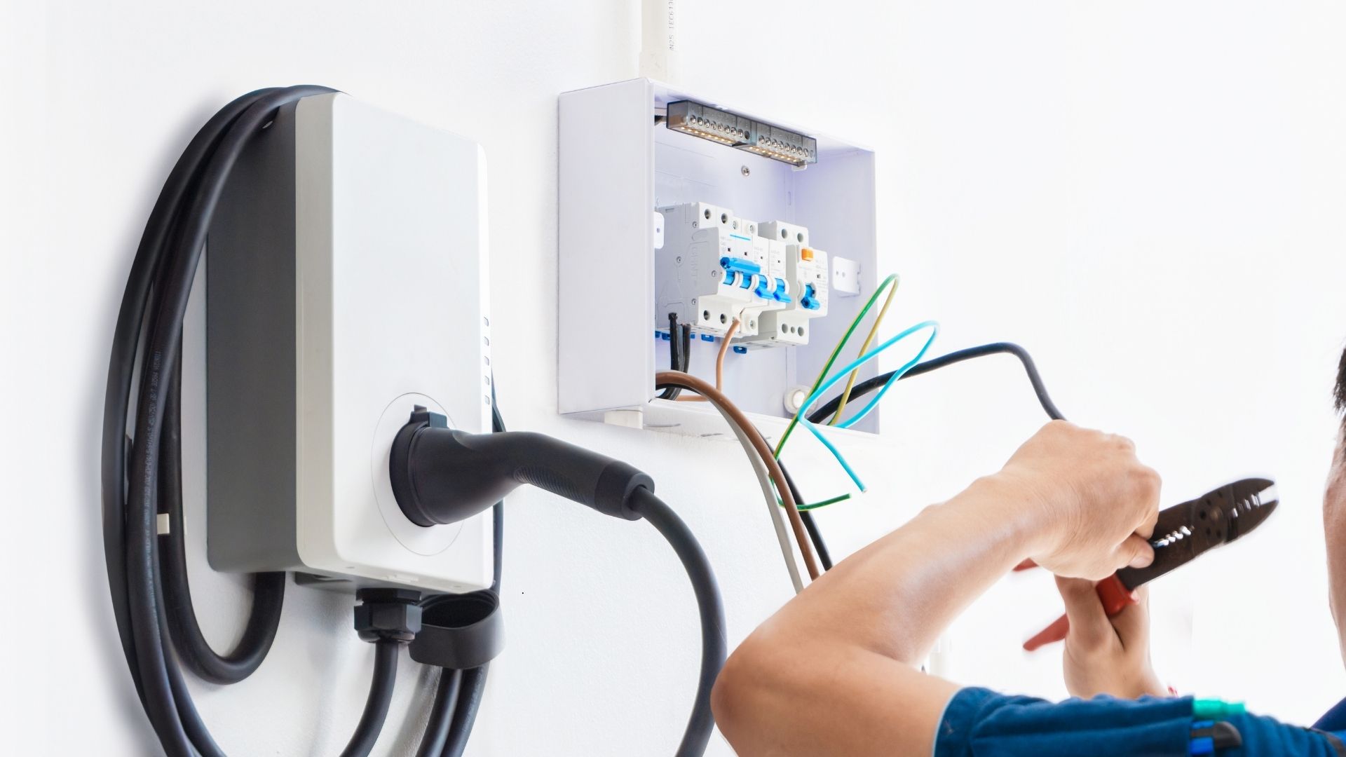electrician installing ev charger